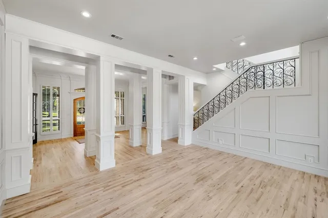 a view of entryway with wooden floor