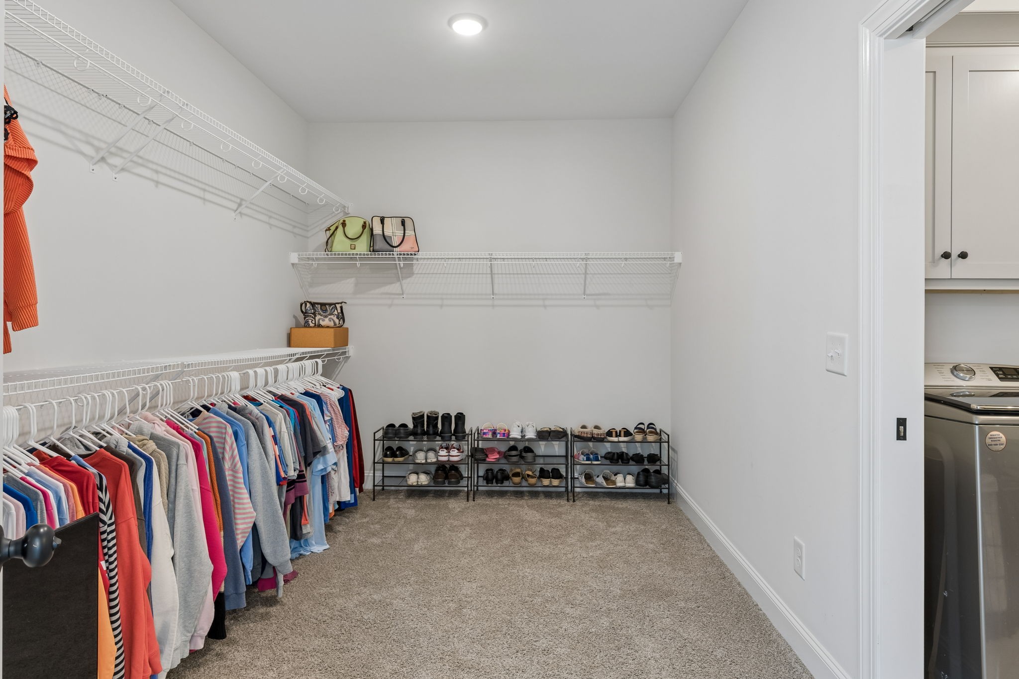 8708 Newtown Road Rockvale, TN 37153 - Photo 26 of 50 a view of walk in closet with clothes and shoes