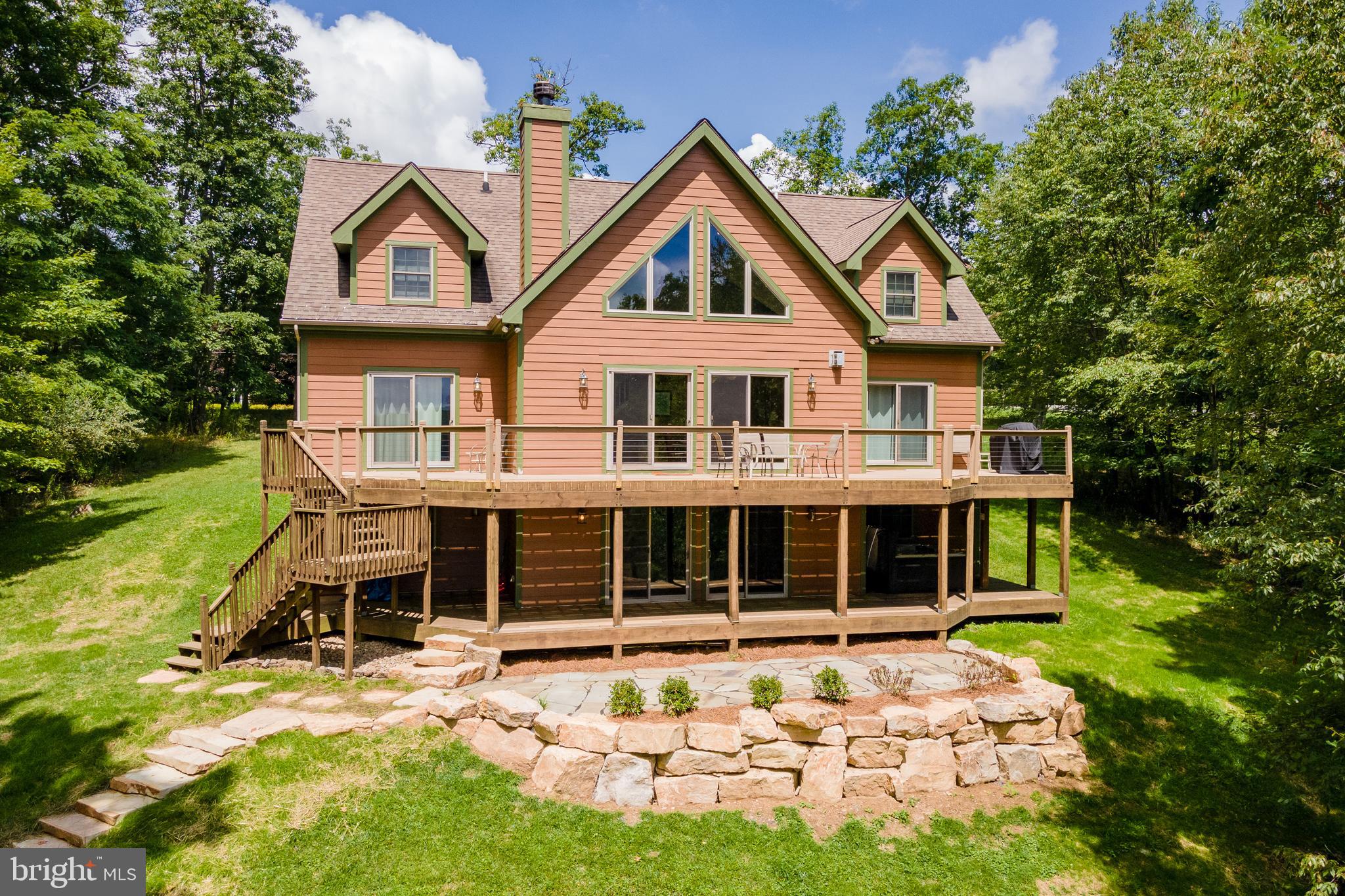 2828 Glendale Road Swanton, MD 21561 - Photo 66 of 78 a front view of a house with a yard
