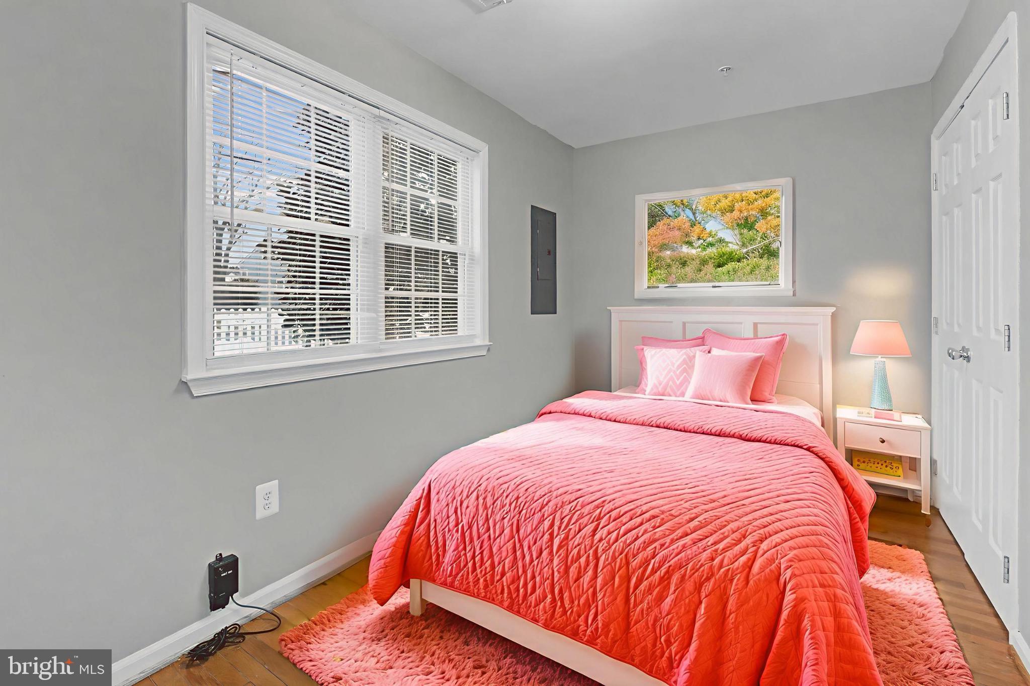 339 Edmund Street Aberdeen, MD 21001 - Photo 12 of 30 Charming bedroom with vibrant coral accents.