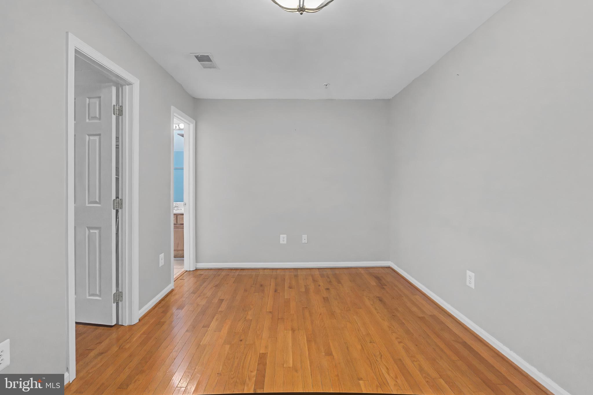339 Edmund Street Aberdeen, MD 21001 - Photo 3 of 30 Bright, versatile space with warm wood floors.