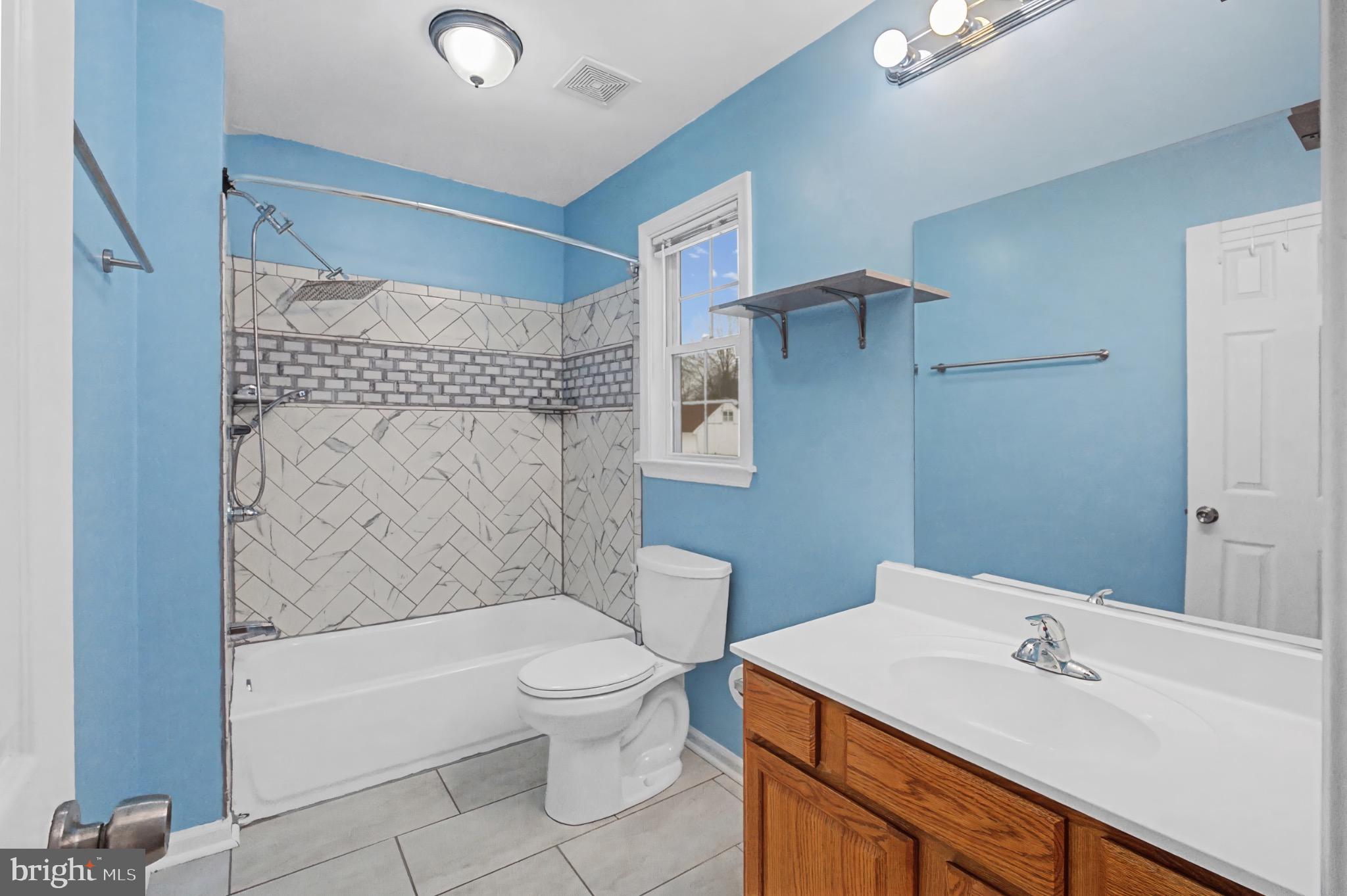 339 Edmund Street Aberdeen, MD 21001 - Photo 5 of 30 Bright and airy bathroom with modern touches.