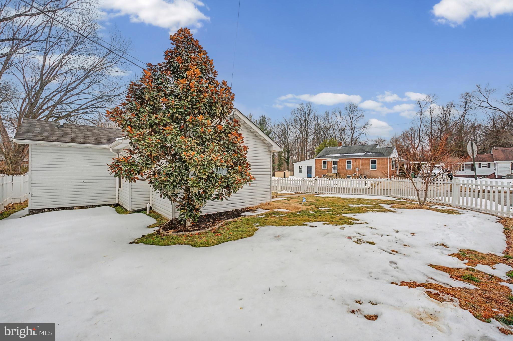 339 Edmund Street Aberdeen, MD 21001 - Photo 6 of 30 Charming yard with winter's last snow.