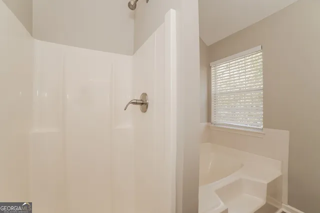 a bathroom with a sink toilet and vanity