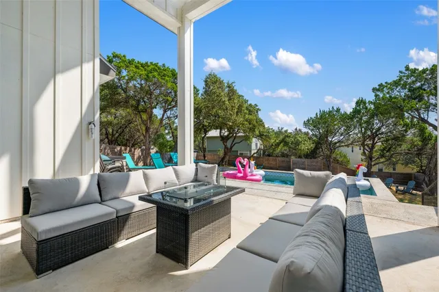 a view of a garden with an outdoor space