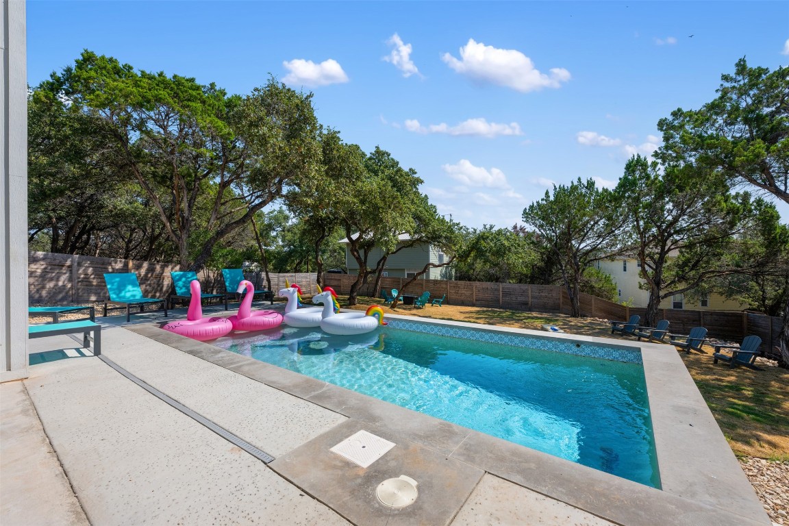 1301 Scenic Circle Spicewood, TX 78669 - Photo 16 of 39 a view of a garden with an outdoor space