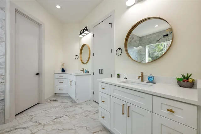 a white tub sitting in a bathroom