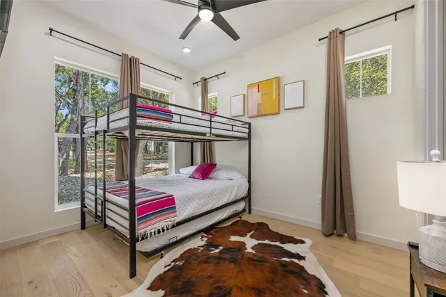 a utility room with cabinets washer and dryer