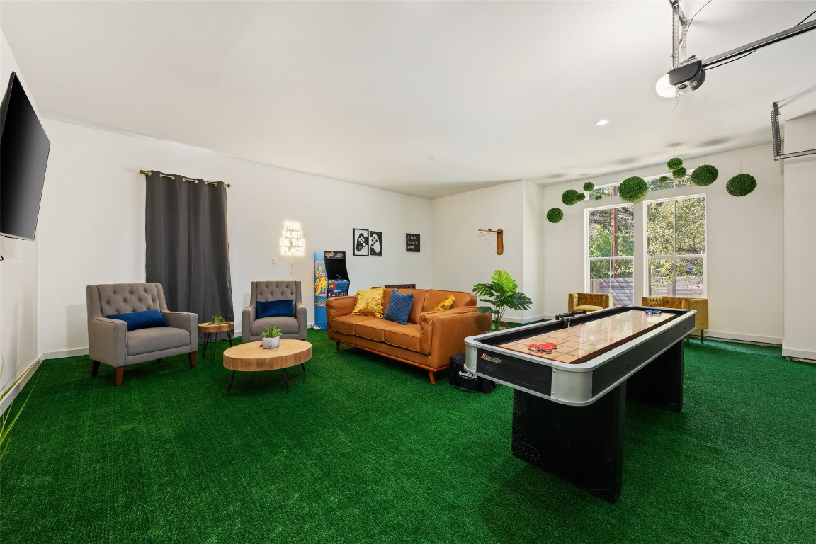 1301 Scenic Circle Spicewood, TX 78669 - Photo 39 of 39 a living room with furniture and a flat screen tv