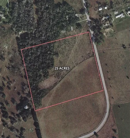 a view of a field with an outdoor space