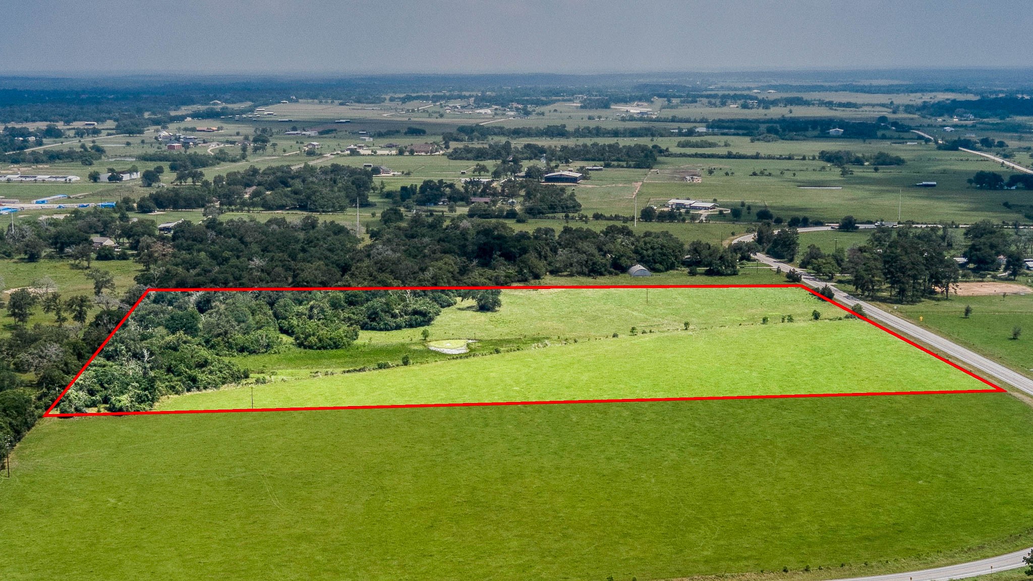 0 Fm 1488 Hempstead, TX 77445 - Photo 9 of 12 a view of a swimming pool and a yard