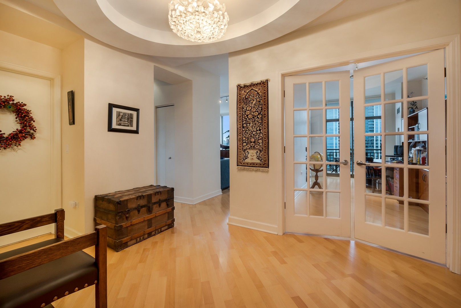 1335 South Prairie Avenue, Unit 1706 Chicago, IL 60605 - Photo 2 of 16 a view of a livingroom with furniture and an entryway