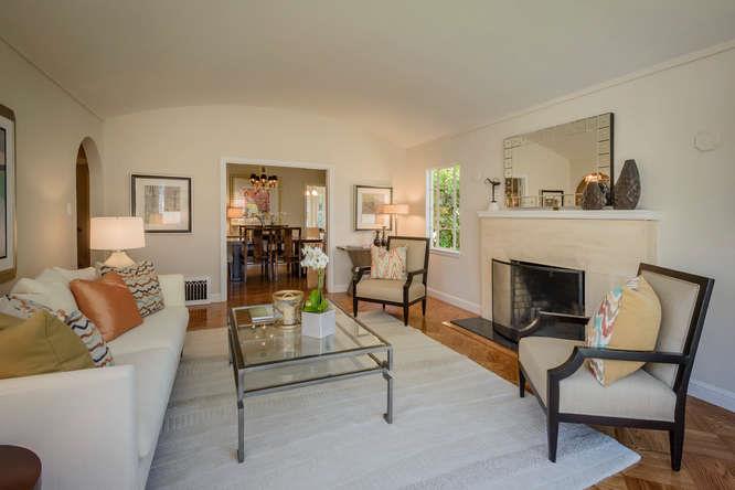 Clarendon Road Burlingame, CA 94010 - Photo 4 of 19 a living room with furniture and a fireplace