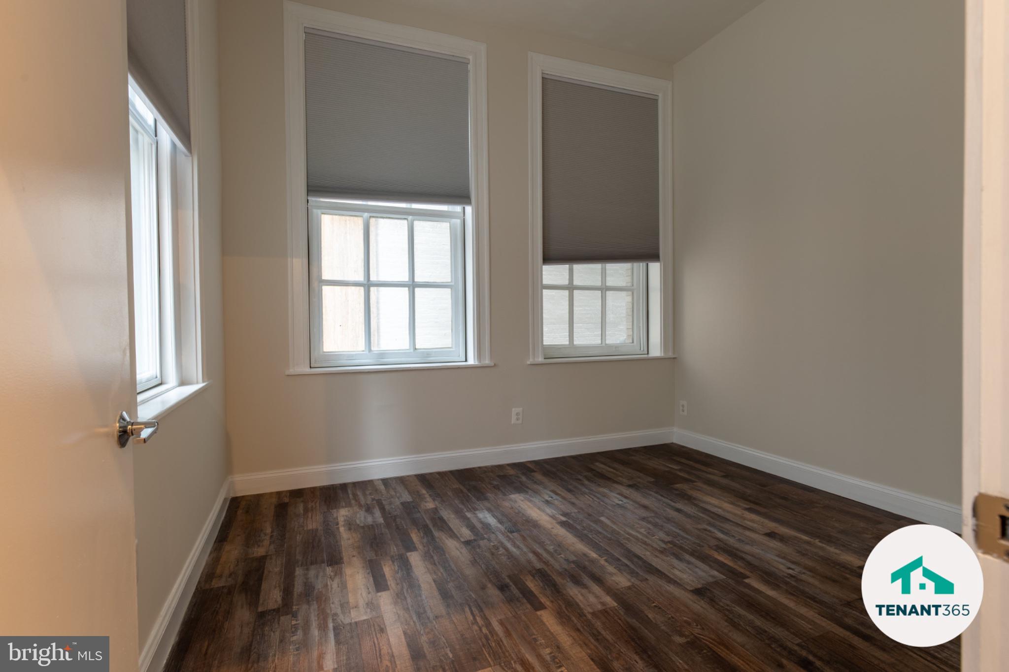 8 East Fayette Street, Unit 201 Baltimore, MD 21202 - Photo 6 of 14 Bright and airy room with charm.
