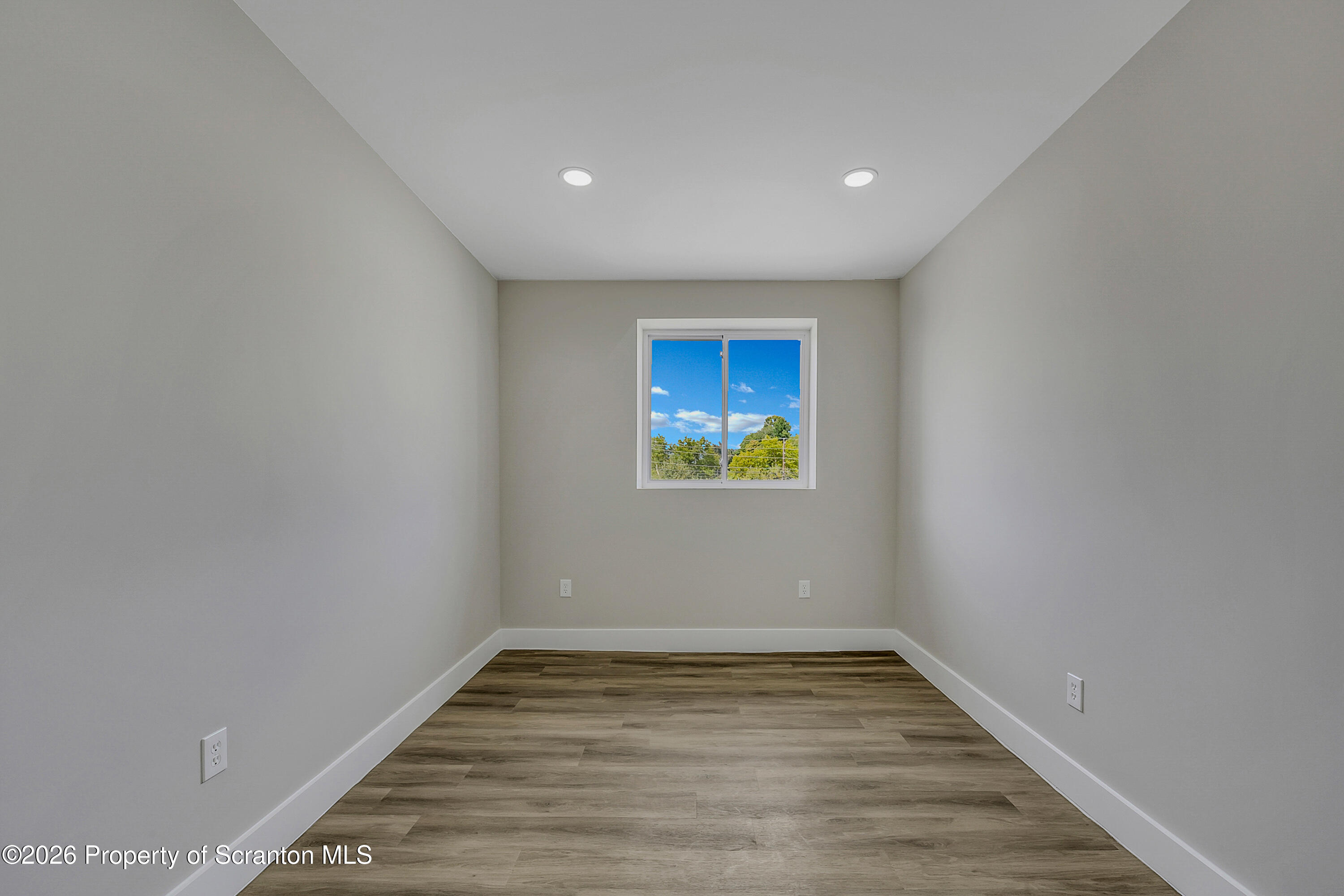 215 Hickory Street, Unit 13 Scranton, PA 18505 - Photo 4 of 13 a view of empty room with wooden floor