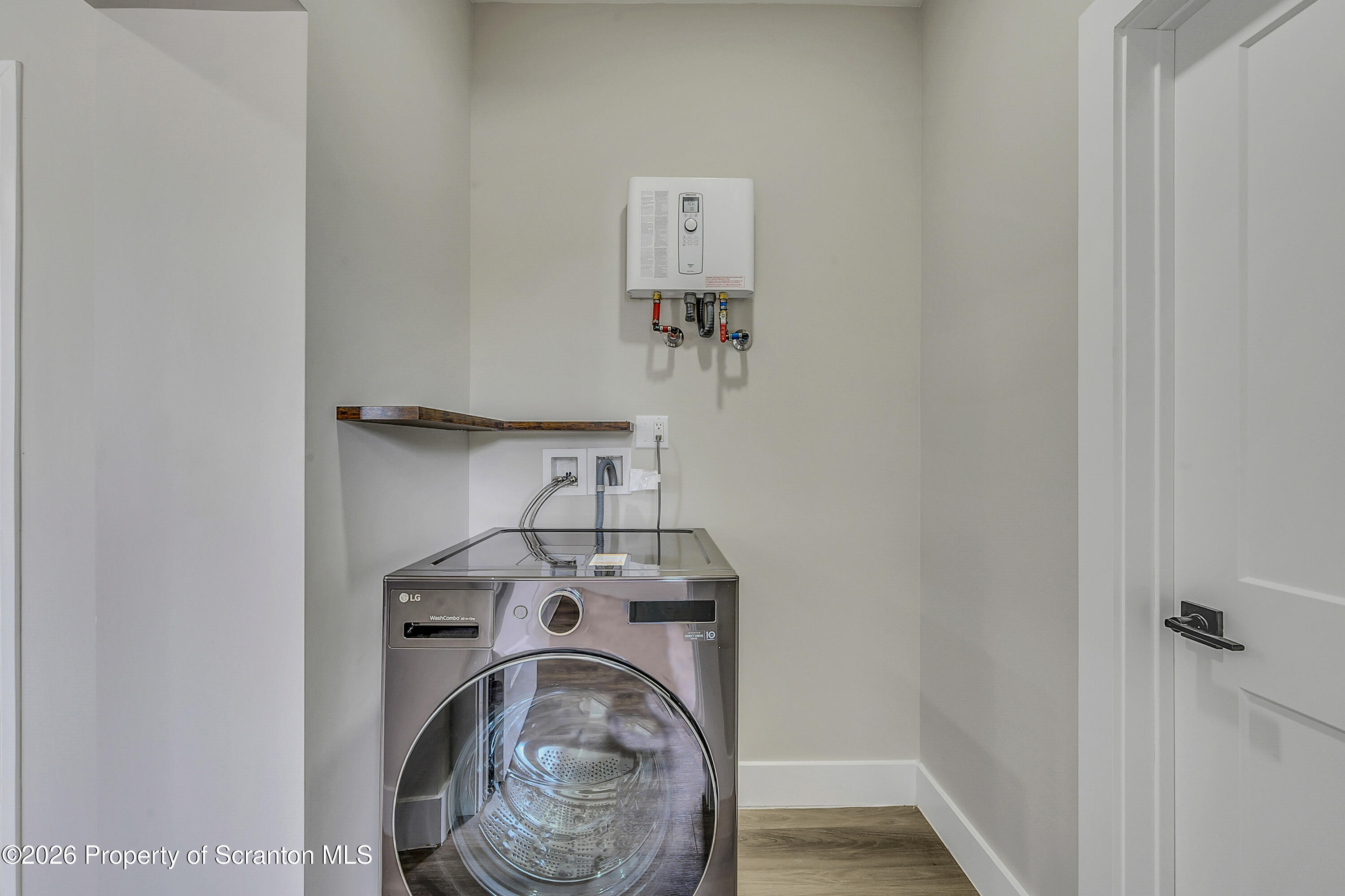215 Hickory Street, Unit 13 Scranton, PA 18505 - Photo 6 of 13 a utility room with dryer and washer