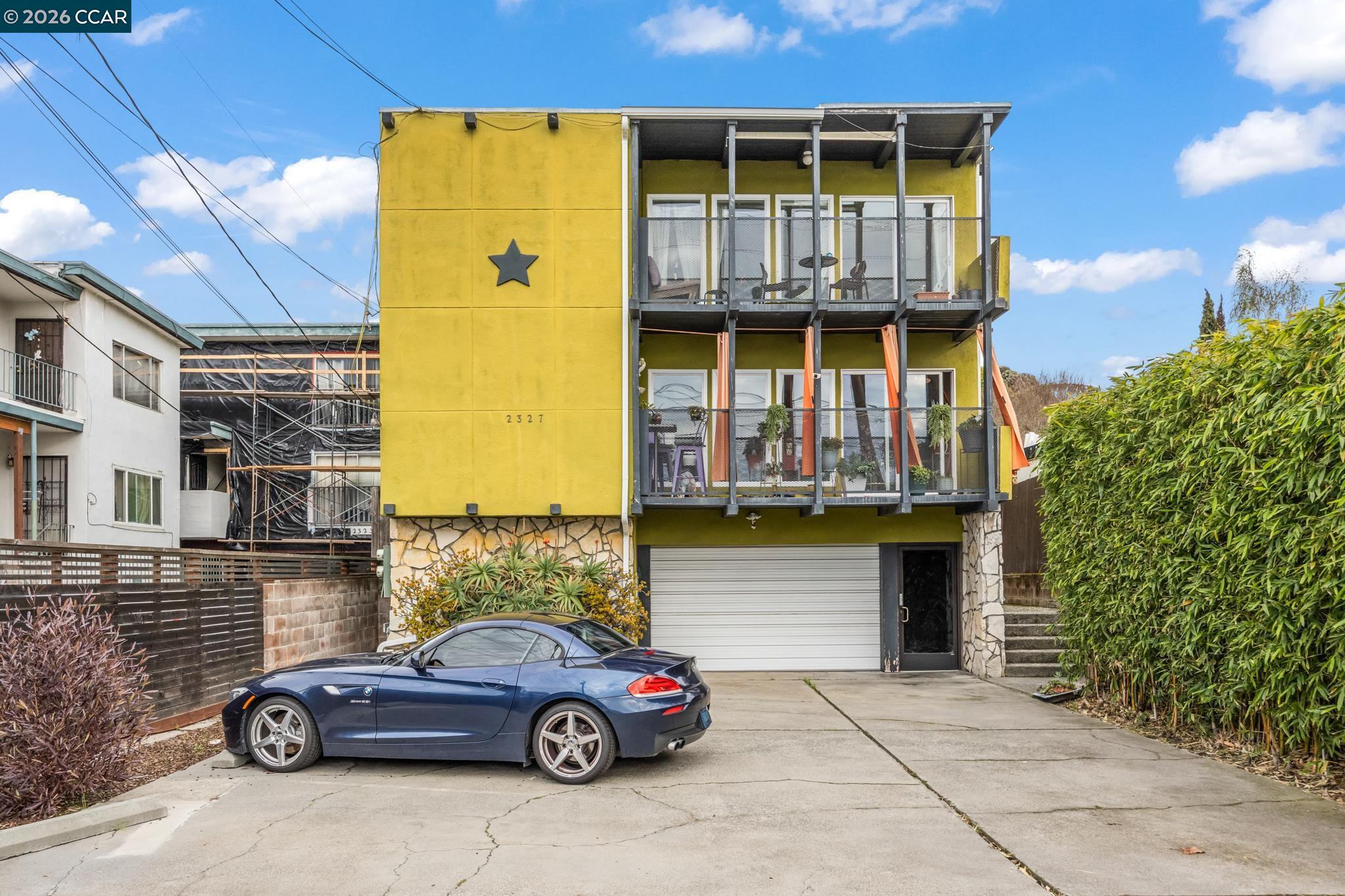 2327 Tenth Street, Unit 4 Berkeley, CA 94710 - Photo 6 of 39 a front view of a house with parking space