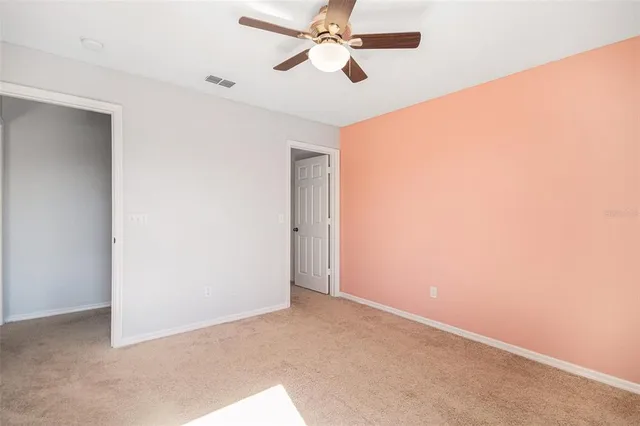 a swimming pool with patio outdoor seating and yard