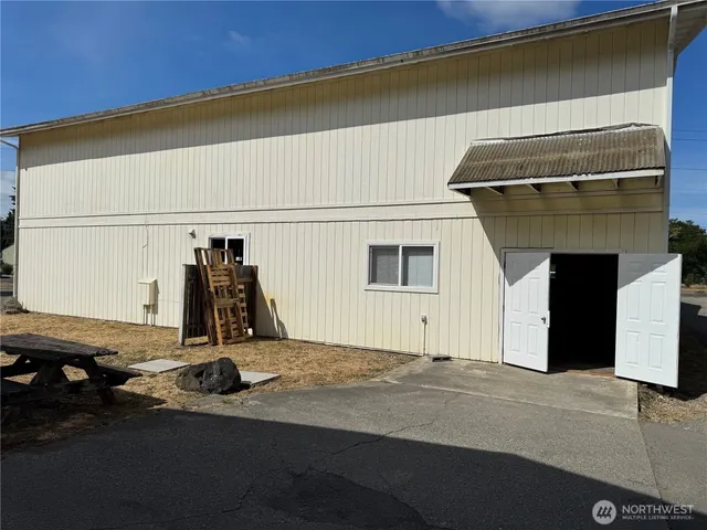 a bathroom with a shower and a sink