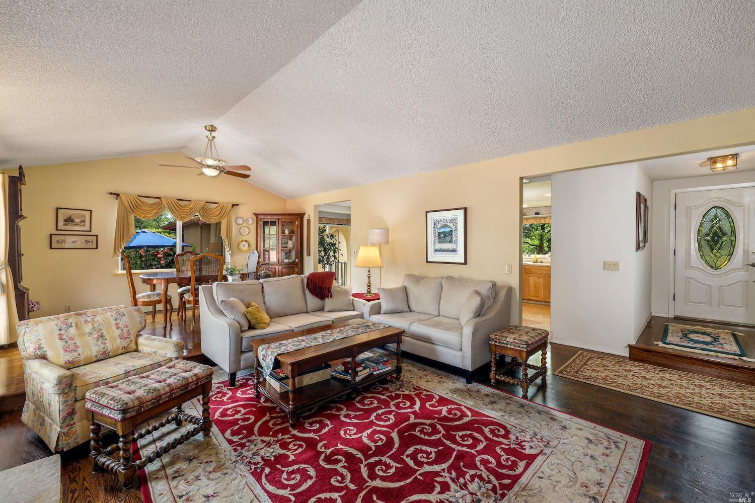 1454 Olivet Road Santa Rosa, CA 95401 - Photo 11 of 30 a living room with furniture and a rug