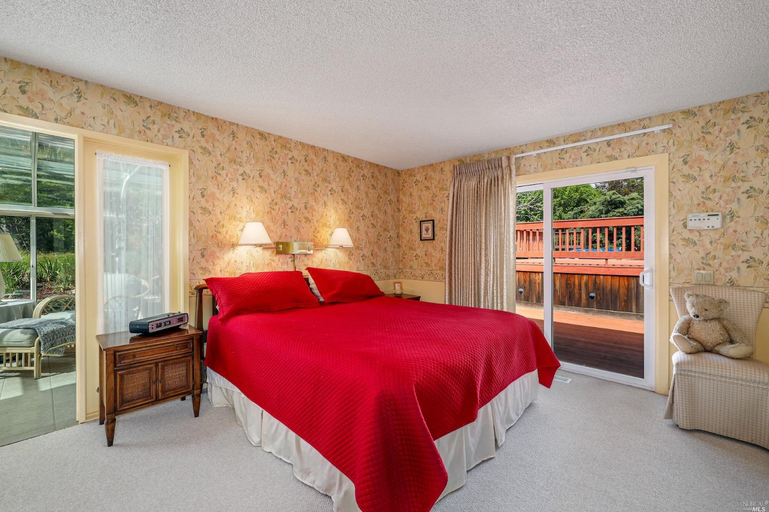 1454 Olivet Road Santa Rosa, CA 95401 - Photo 12 of 30 a bedroom with a bed and a couch