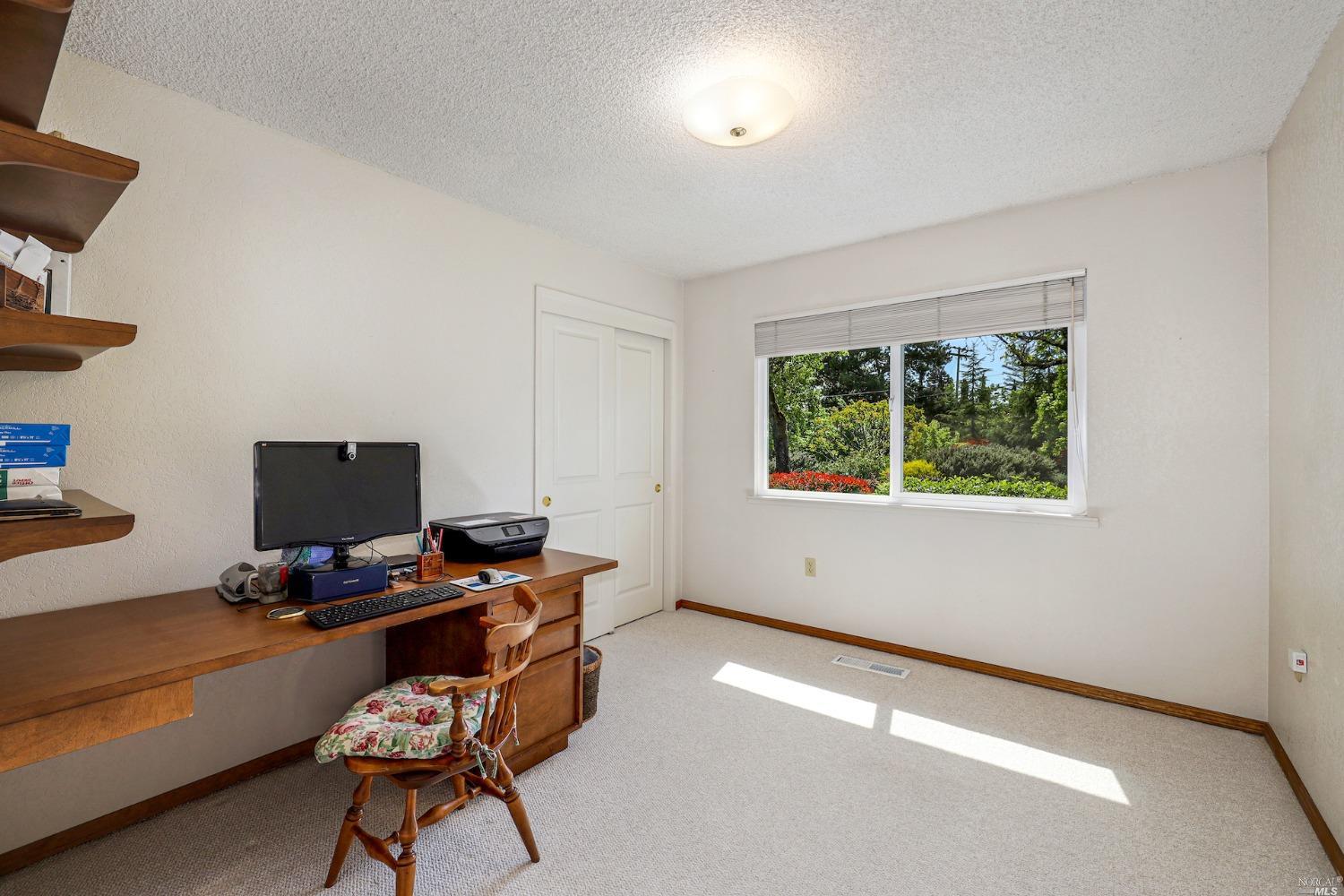 1454 Olivet Road Santa Rosa, CA 95401 - Photo 14 of 30 a workspace with furniture and window
