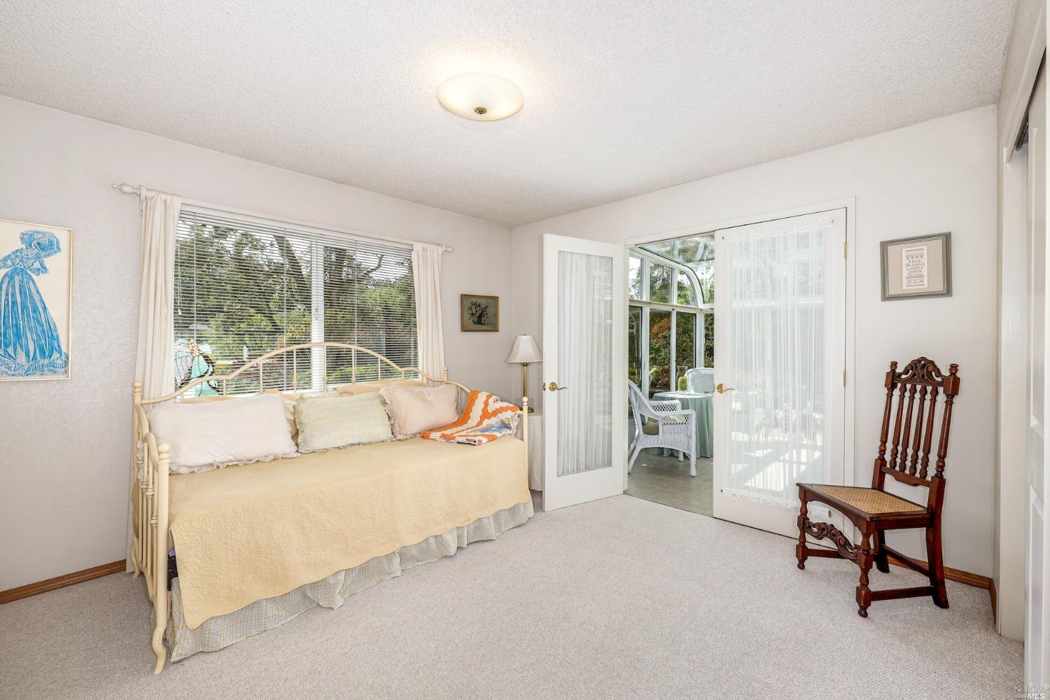 1454 Olivet Road Santa Rosa, CA 95401 - Photo 16 of 30 a living room with furniture and a large window