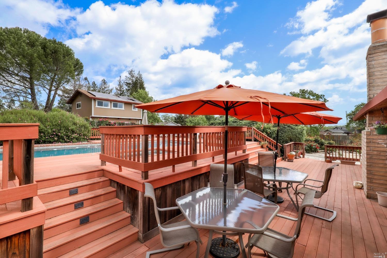 1454 Olivet Road Santa Rosa, CA 95401 - Photo 18 of 30 a view of a roof deck with chair and wooden floor