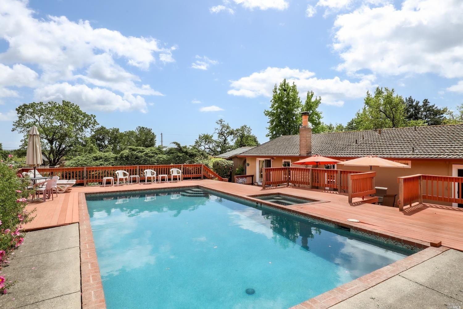 1454 Olivet Road Santa Rosa, CA 95401 - Photo 19 of 30 a view of a swimming pool with lounge chair