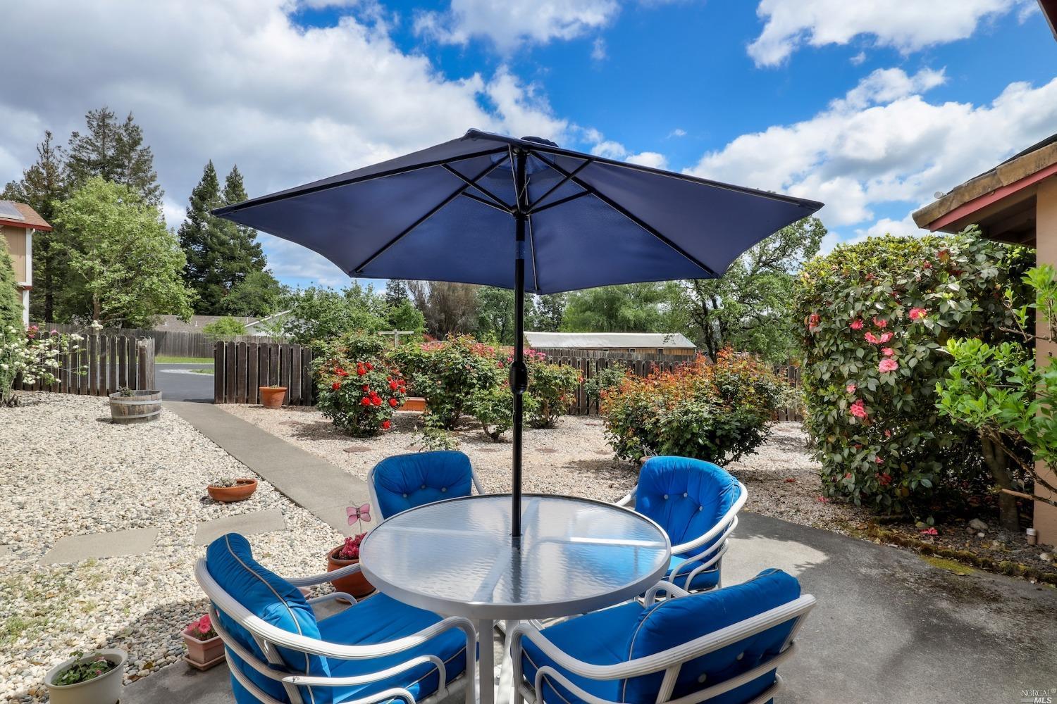 1454 Olivet Road Santa Rosa, CA 95401 - Photo 22 of 30 a view of a backyard with sitting area and furniture