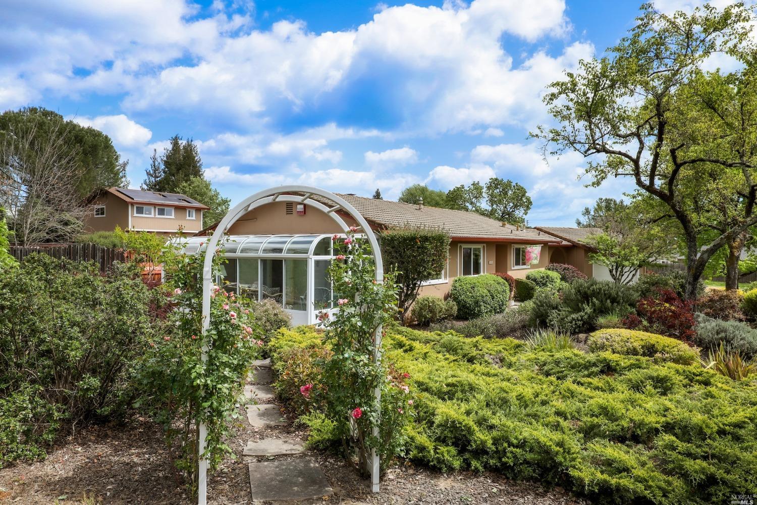 1454 Olivet Road Santa Rosa, CA 95401 - Photo 23 of 30 a front view of a house with garden and trees