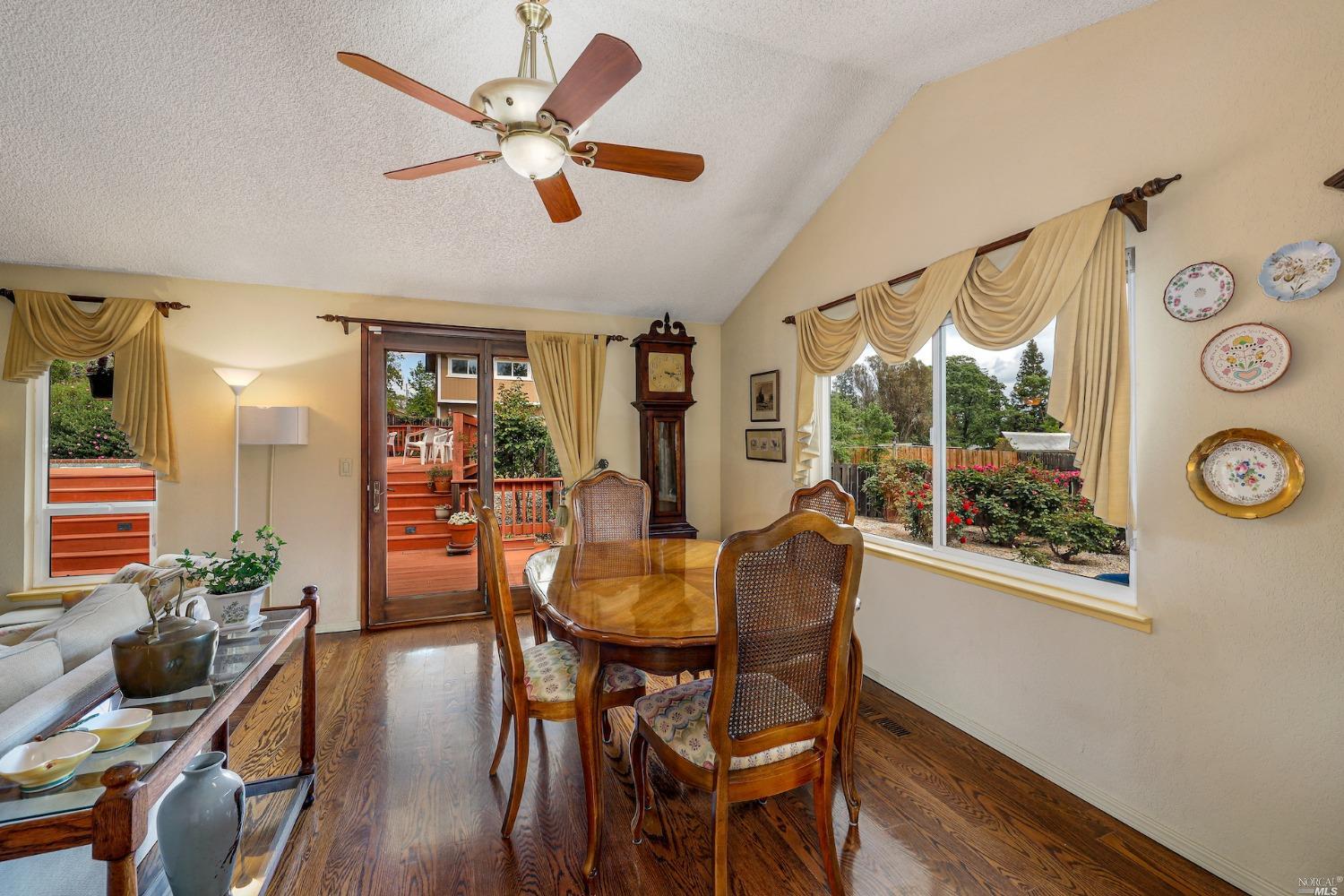 1454 Olivet Road Santa Rosa, CA 95401 - Photo 10 of 30 a view of a dining room with furniture window and wooden floor