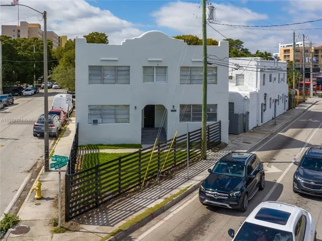 a car parked in front of a house