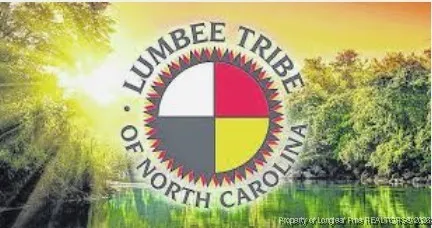 a view of swimming pool with a garden and a bench