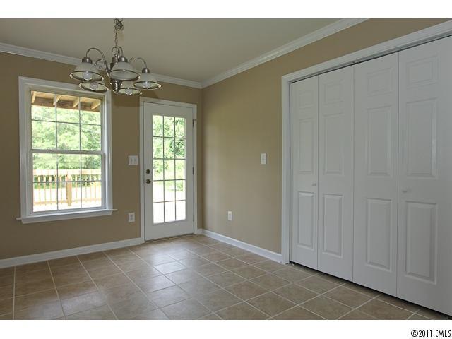 1740 Dunlap Roddey Road Rock Hill, SC 29730 - Photo 8 of 16 a view of an empty room with a window