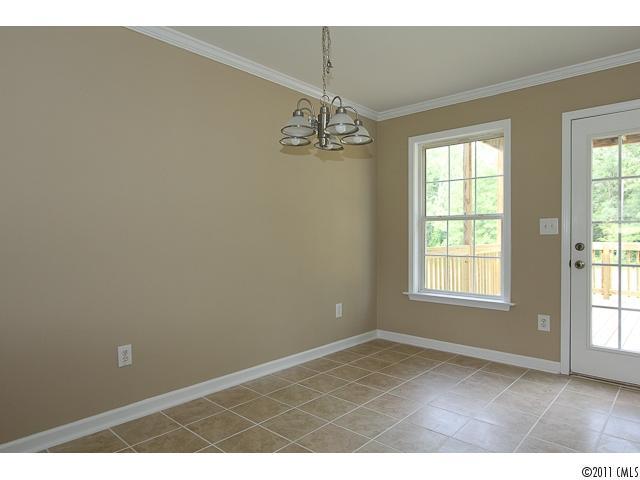1740 Dunlap Roddey Road Rock Hill, SC 29730 - Photo 9 of 16 a view of an empty room with a window