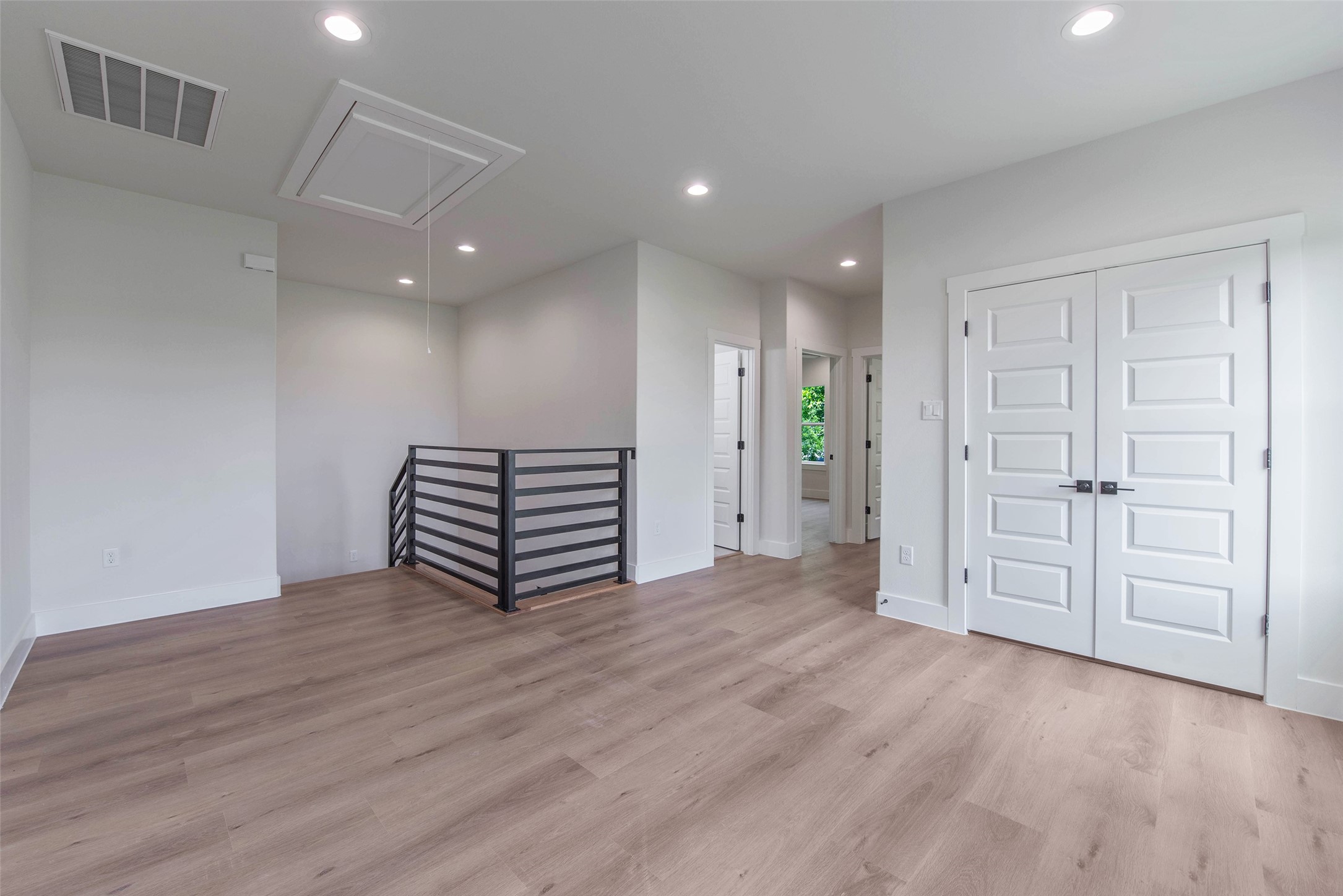 9311 Jutland Road Houston, TX 77033 - Photo 17 of 28 The doors open to two well-appointed secondary bedrooms and the secondary bath.