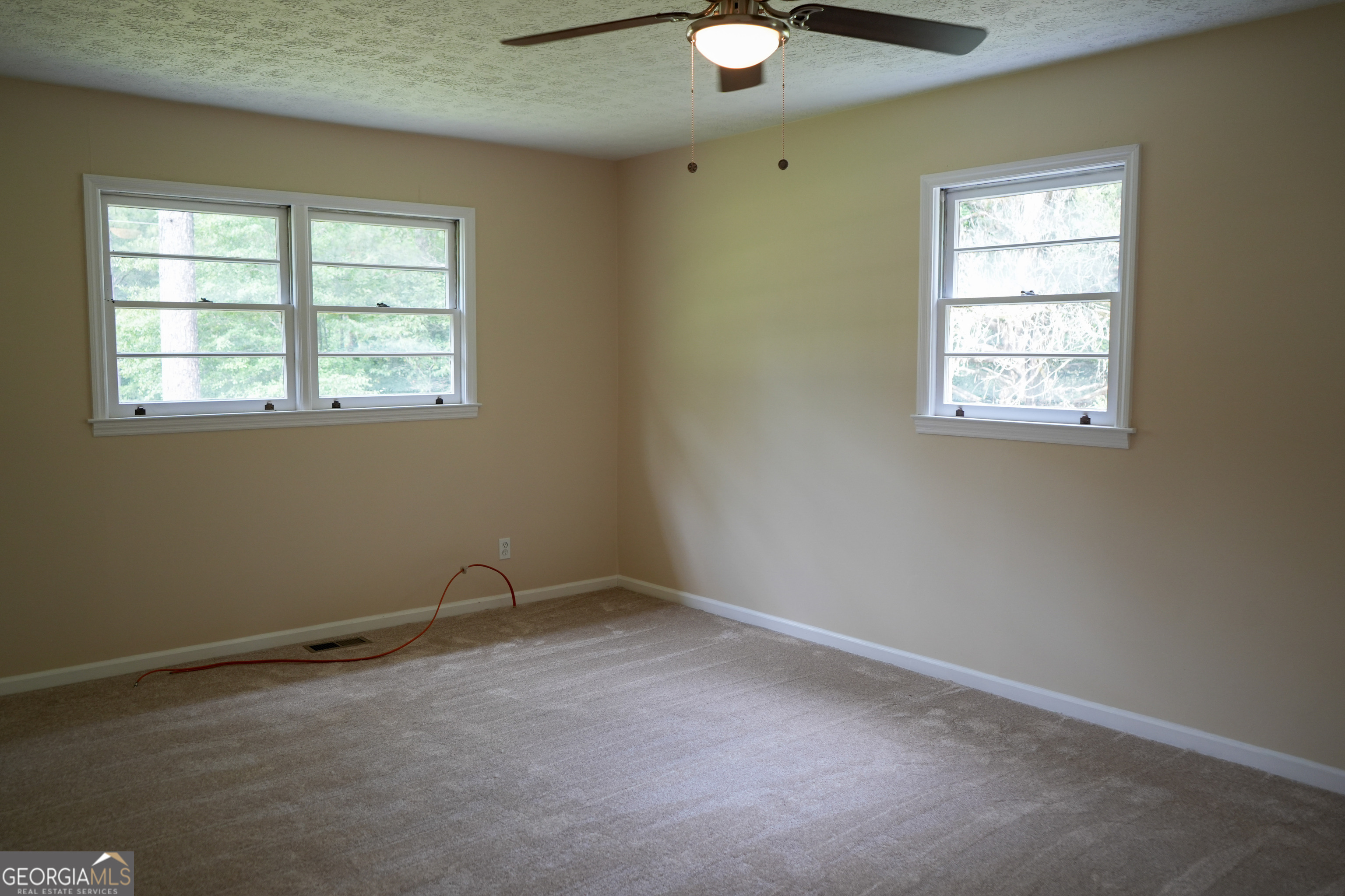 1869 Minter Blue Springs Road Rockledge, GA 30454 - Photo 32 of 45 an empty room with a window