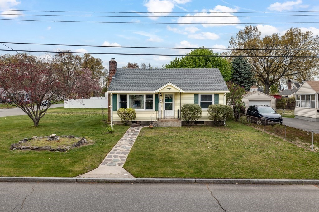 4 Jean Drive Springfield, MA 01104 - Photo 1 of 26 a front view of a house with garden