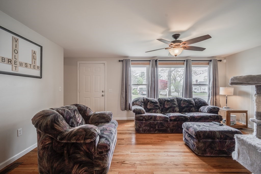 4 Jean Drive Springfield, MA 01104 - Photo 11 of 26 a living room with furniture a ceiling fan and a large window