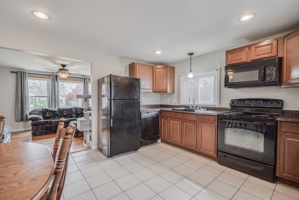 4 Jean Drive Springfield, MA 01104 - Photo 15 of 26 a kitchen with stainless steel appliances granite countertop a refrigerator stove and sink