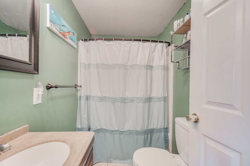 4 Jean Drive Springfield, MA 01104 - Photo 18 of 26 a bathroom with a sink toilet and shower