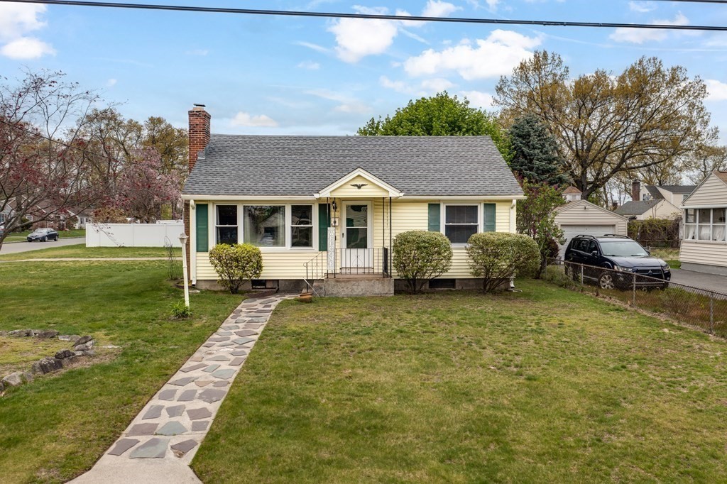 4 Jean Drive Springfield, MA 01104 - Photo 2 of 26 a front view of a house with a garden