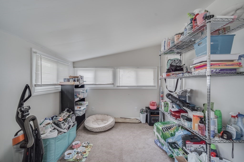 4 Jean Drive Springfield, MA 01104 - Photo 25 of 26 a room with storage and a table