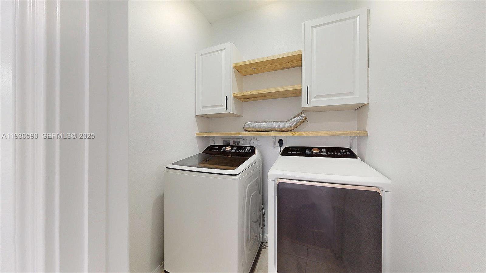 25324 Southwest 119th Avenue Homestead, FL 33032 - Photo 25 of 41 a utility room with dryer and washer