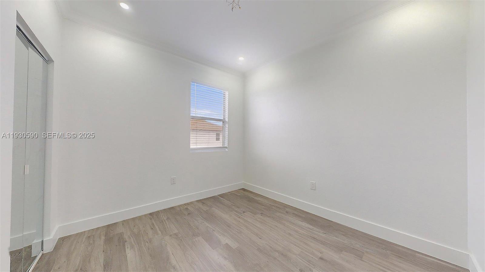 25324 Southwest 119th Avenue Homestead, FL 33032 - Photo 30 of 41 wooden floor in an empty room