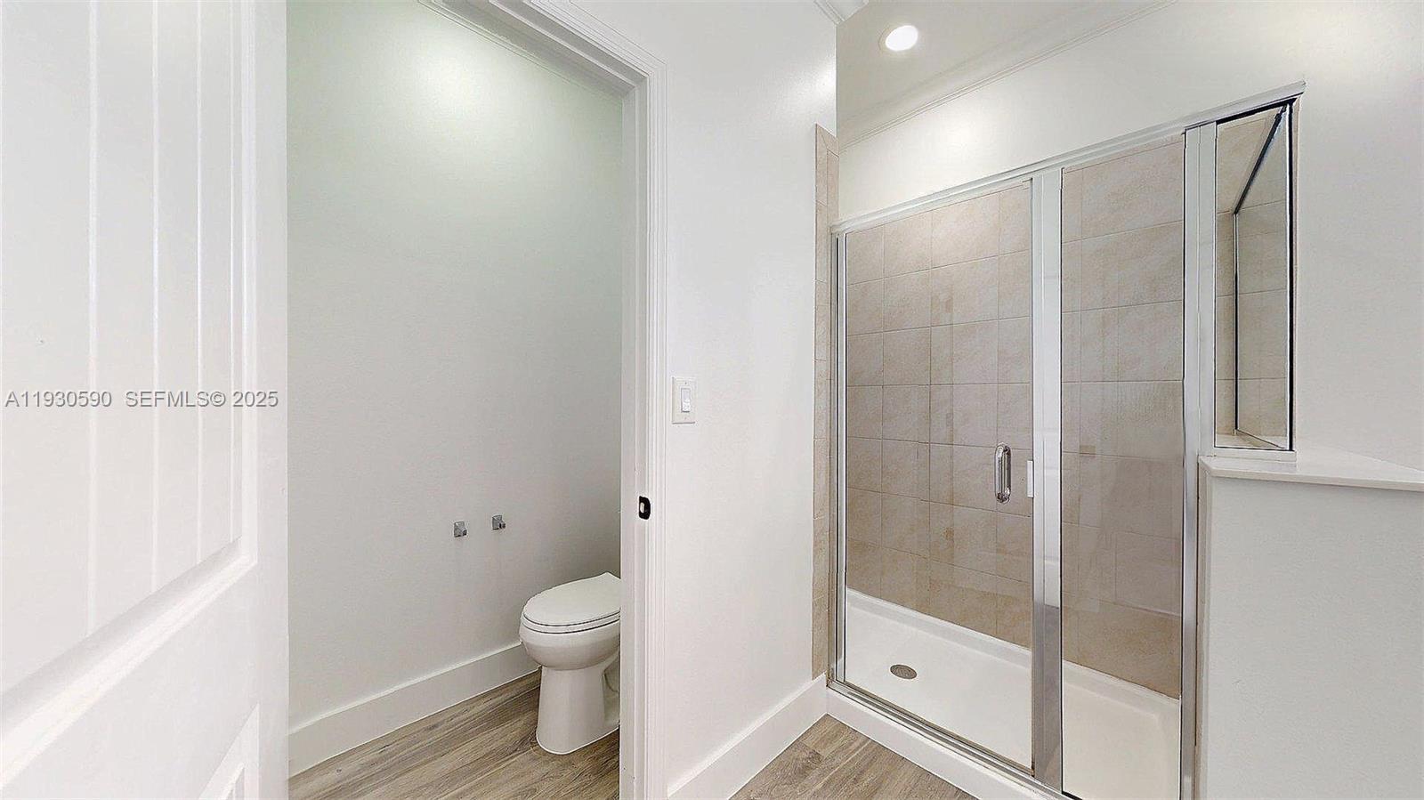 25324 Southwest 119th Avenue Homestead, FL 33032 - Photo 37 of 41 a bathroom with a shower and a toilet