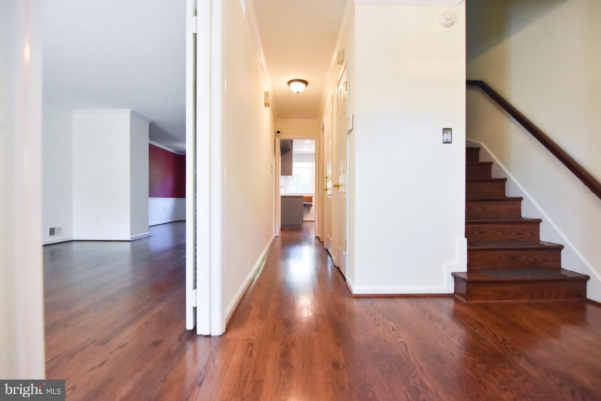 3302 Spring Lane Falls Church, VA 22041 - Photo 2 of 30 a view of a hallway with wooden floor
