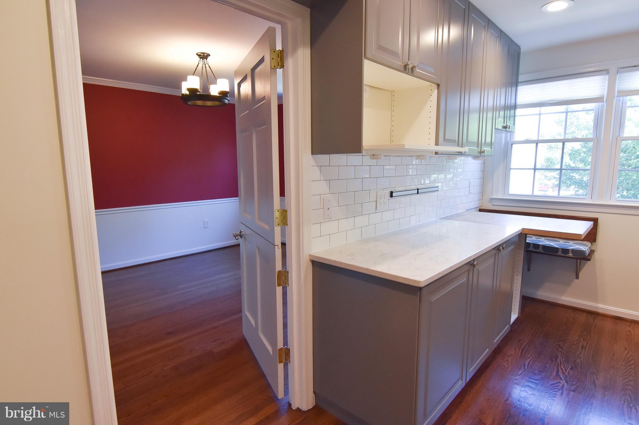 3302 Spring Lane Falls Church, VA 22041 - Photo 11 of 30 a kitchen with a sink and a mirror