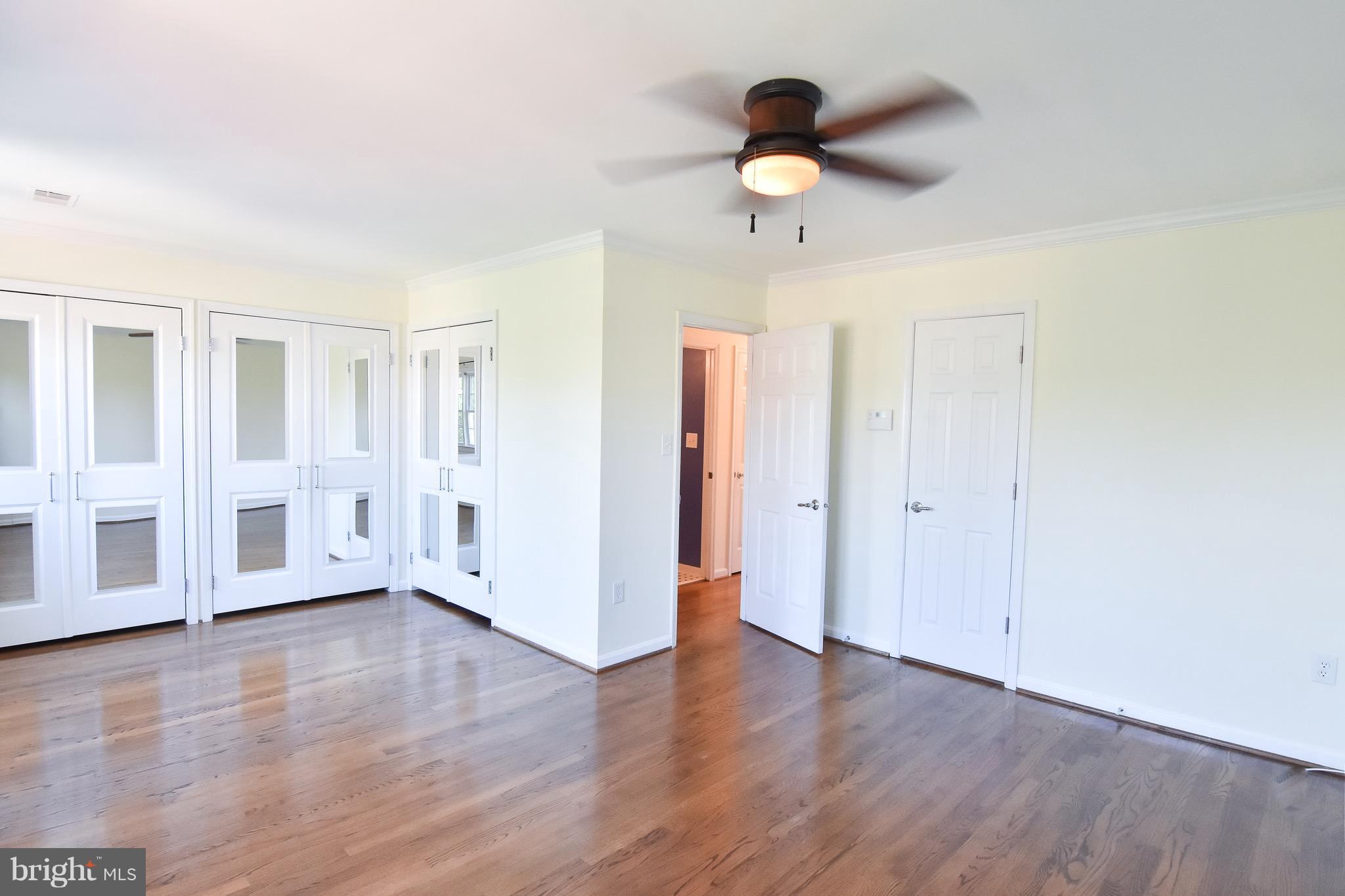 3302 Spring Lane Falls Church, VA 22041 - Photo 15 of 30 a view of an empty room with a window and wooden floor